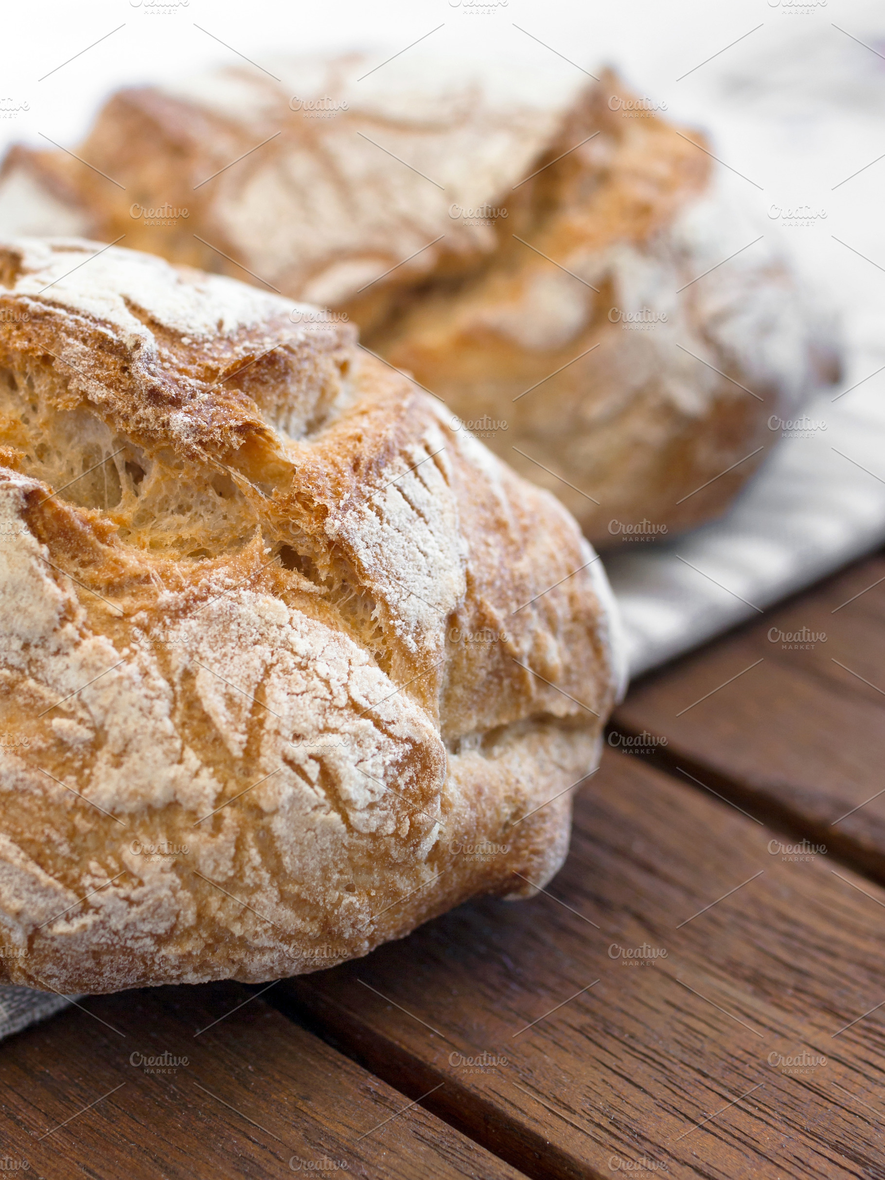 Round bread close-up, a Food & Drink Photo by KYNA STUDIO