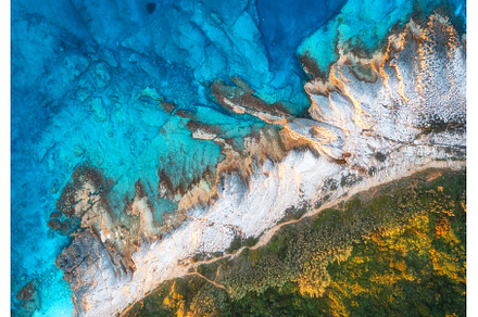 Aerial view of blue sea, rocks in, a Nature Photo by den-belitsky