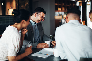 Businesspeople discussing work over