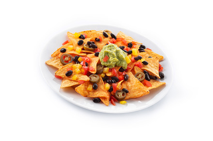 Mexican nachos tortilla chips with black beans, guacamole, tomato and jalapeno, a Background Photo by etorres69