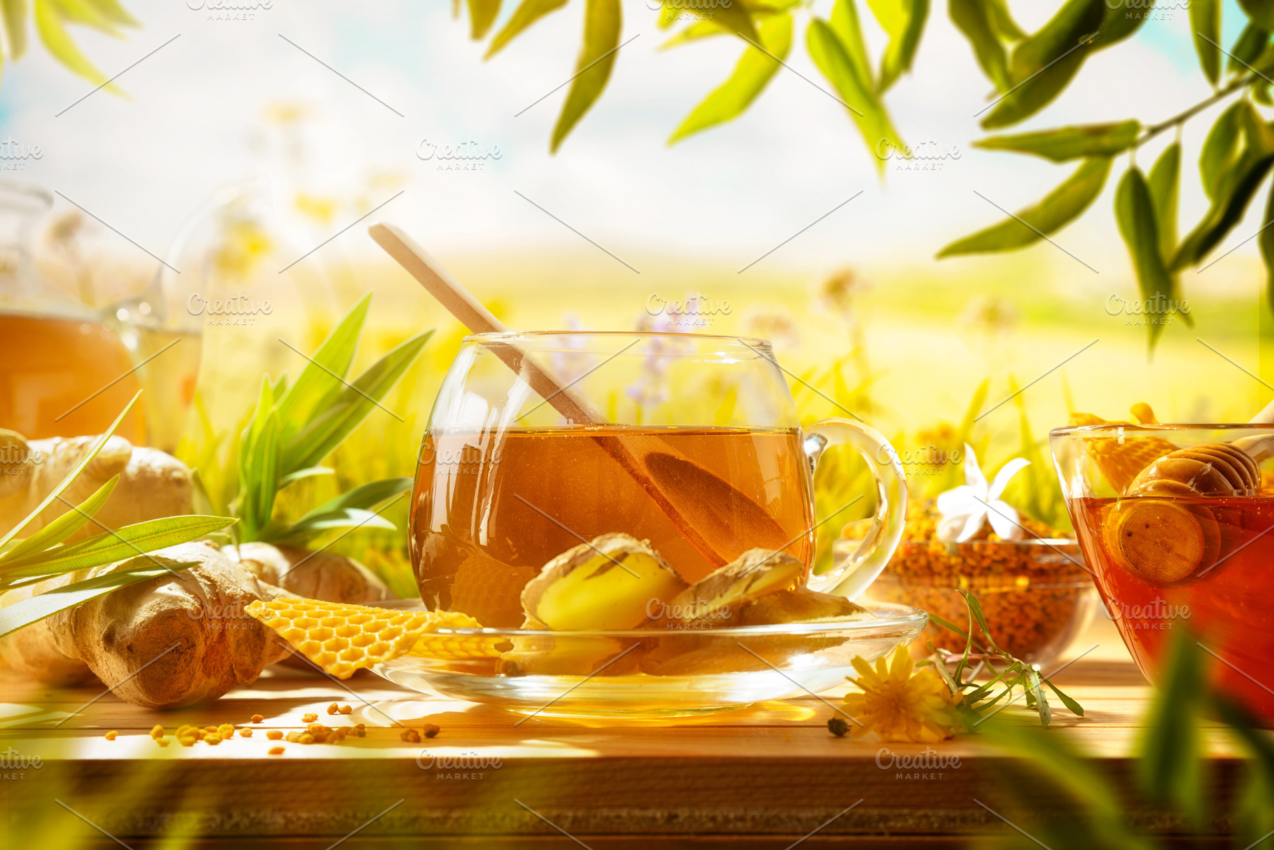 Natural herbal beverage with honey and ginger in meadow, a Food & Drink Photo by Davizro's Market