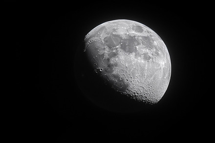 Moon with craters and surface detail, a Background Photo by MistyDay