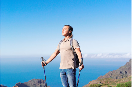 Happy middle aged man traveler while, a Sports & Recreation Photo by Neirfy