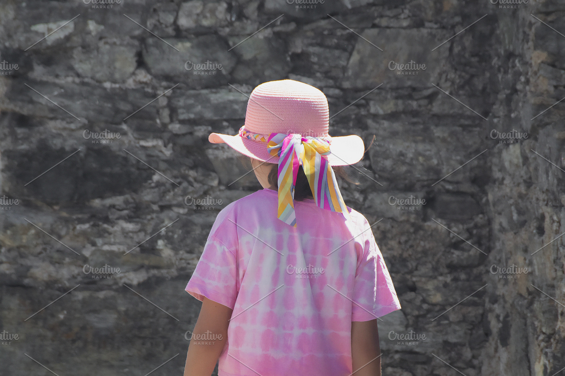 Girl walking at braganca castle, branganca, portugal, a Person Photo by DanFLCreativo