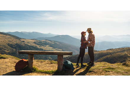 Couple of Hikers With Backpacks in