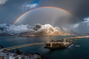 Rainbow above snowy mountains, a Photo by Beautiful things
