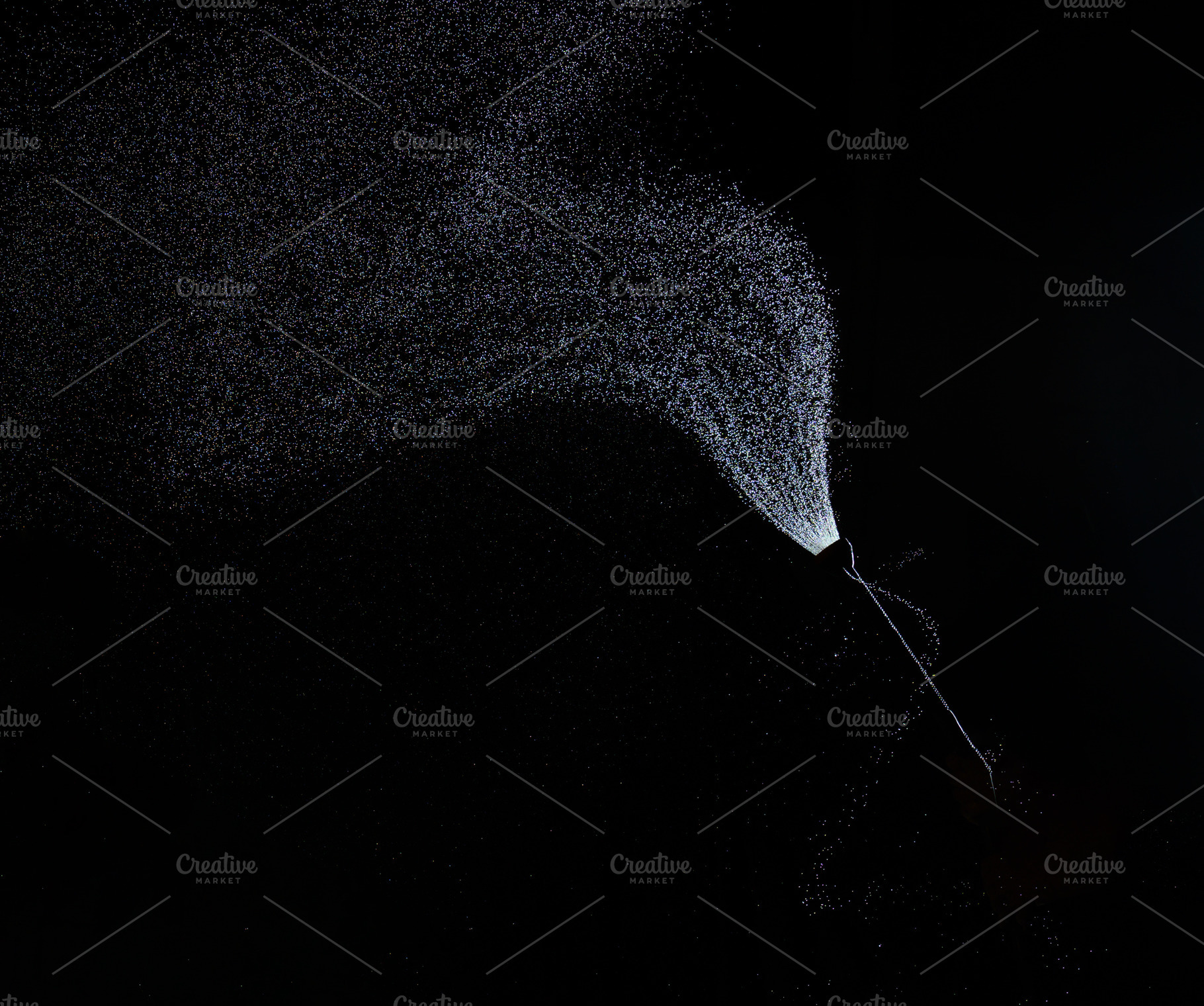 Stream of fine droplets of water escaping from a hose in complet, a Background Photo by ndanko