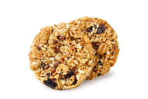 Granola cookies close-up on a white, a Food & Drink Photo by innakreativ