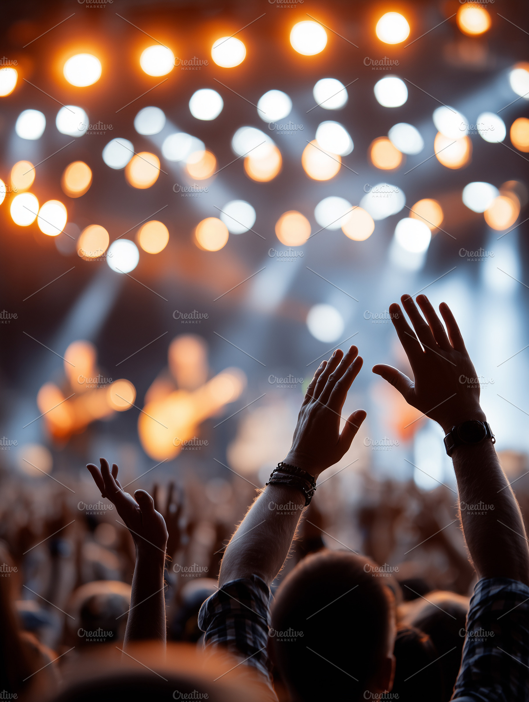 Excited crowd with raised hands, an Arts & Entertainment Photo by MistyDay