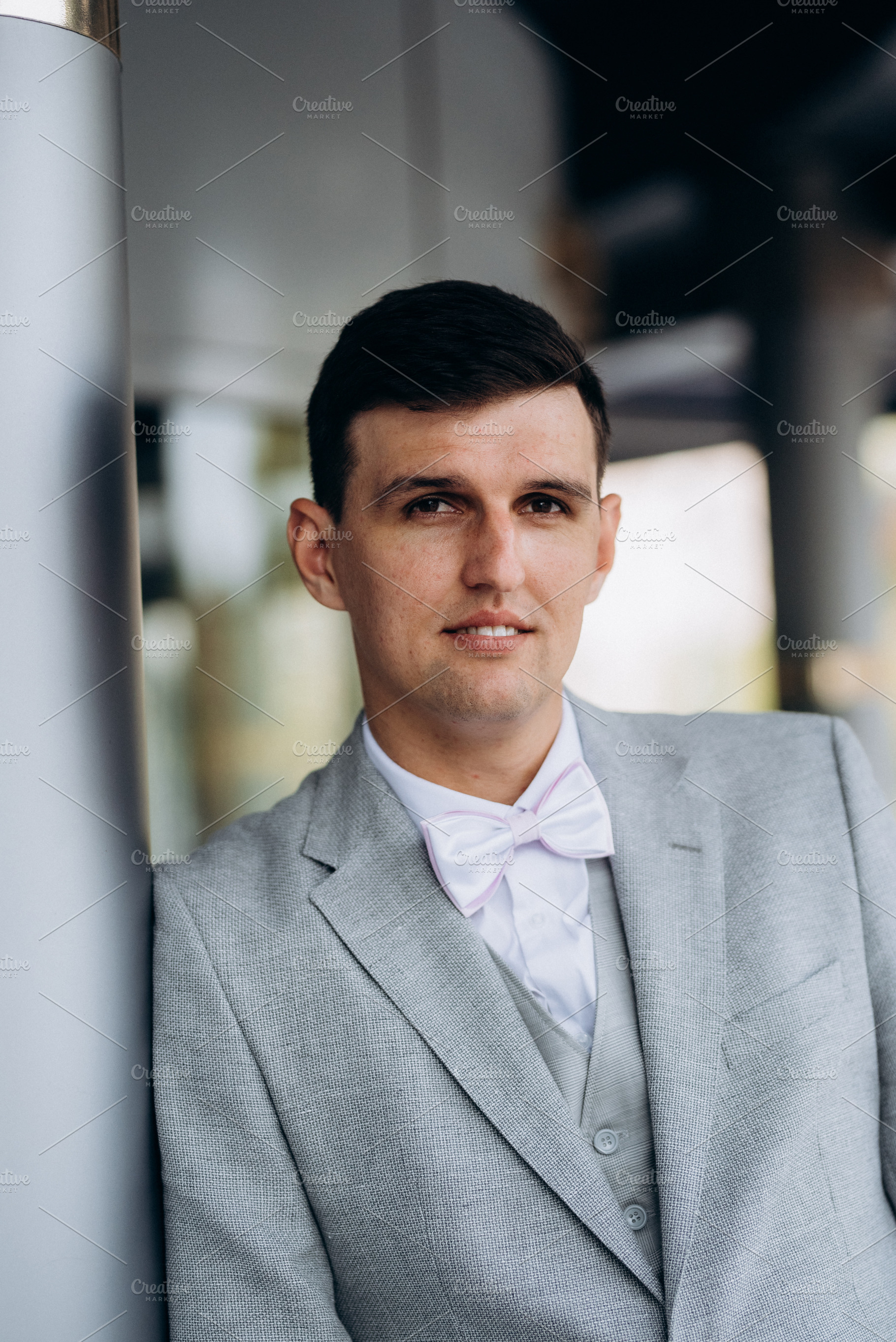 portrait of a groom in a suit and white bow, a Person Photo by Weddings, People, Travel