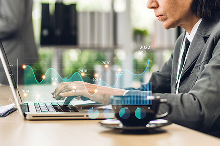 Portrait of success businesswoman using technology of laptop loo, a Person Photo by Art_Photo