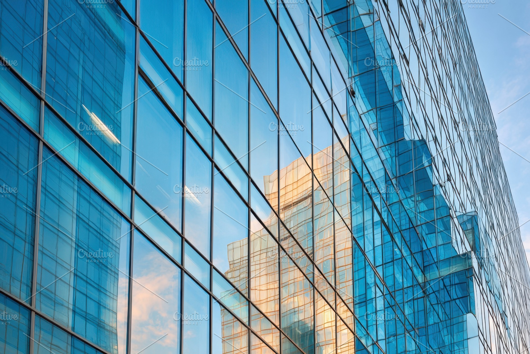 Modern glass building facade at sunset, an Architecture Photo by AlyaAnd