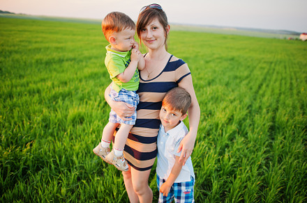 Mother with two son in green field., a Person Photo by AS photostudio
