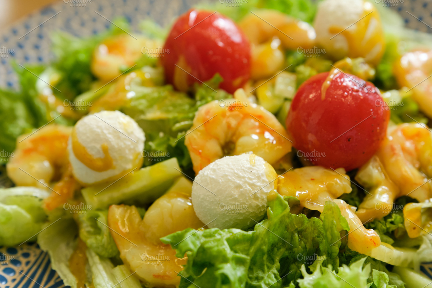 Macro shot of seafood salad with juicy shrimps, cherry tomatoes and mozzarella., a Food & Drink Photo by Rohan Photography