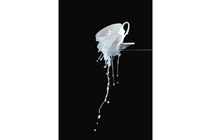 Porcelain cup melting in a white