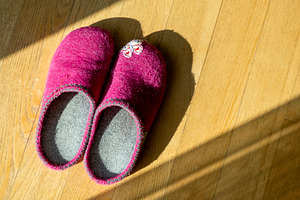 Pink slippers on high contrast floor, a Beauty & Fashion Photo by BOOCYS