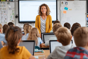 Teacher addressing elementary school, a Photo by Pixeness Studio