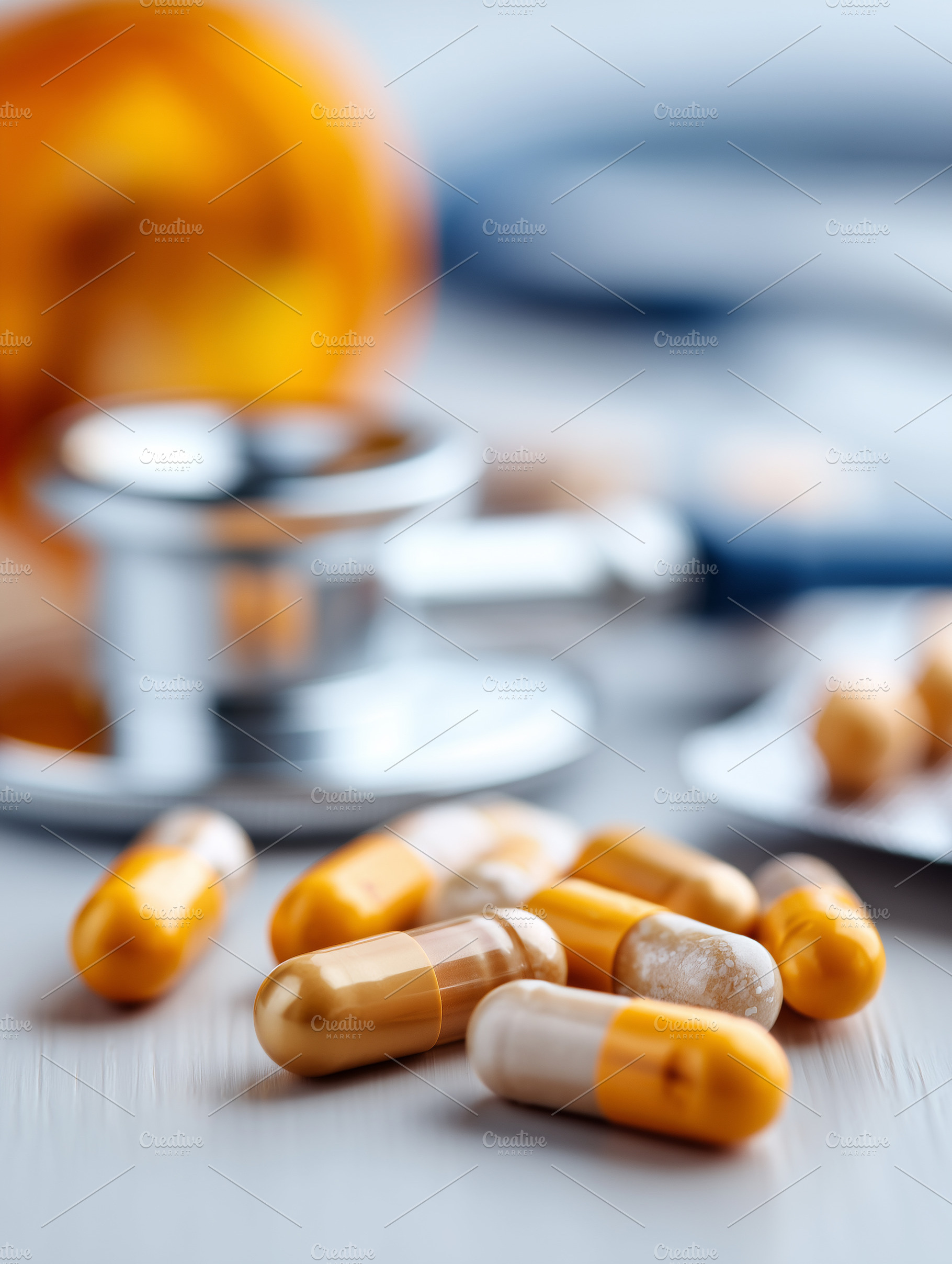 Close up of yellow medicine capsules, a Health & Medical Photo by MistyDay