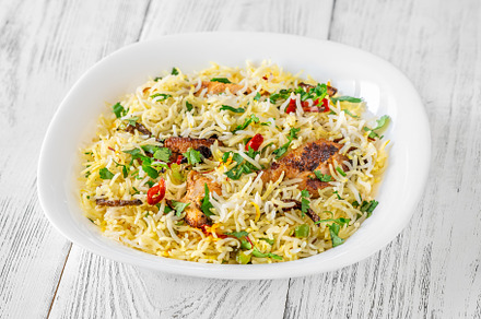 Bowl of biryani, a Food & Drink Photo by Alexander Prokopenko