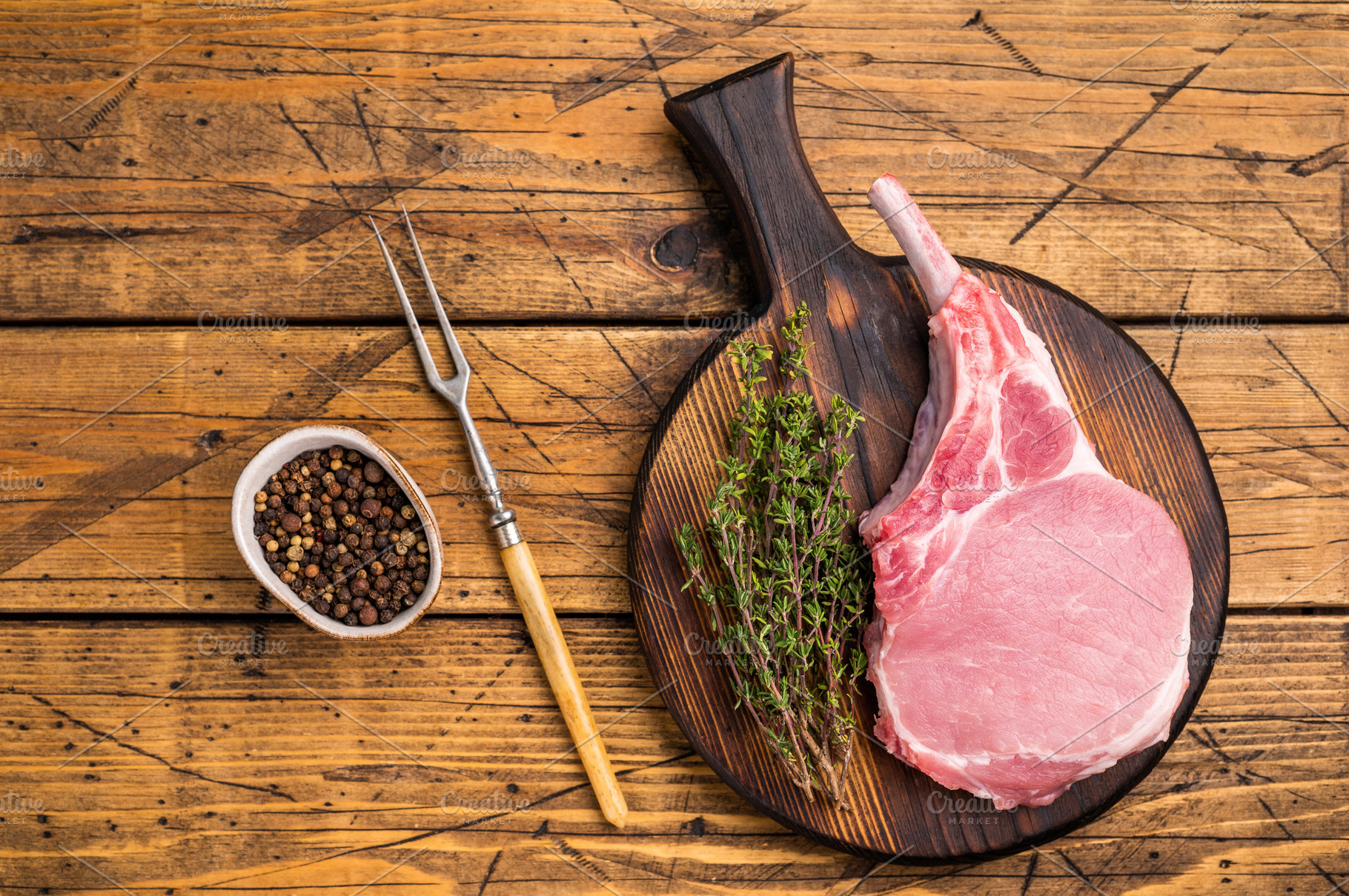 Pristine pork loin chop, featuring a thick cut and beautiful mar, a Food & Drink Photo by composter-box@mail.ru