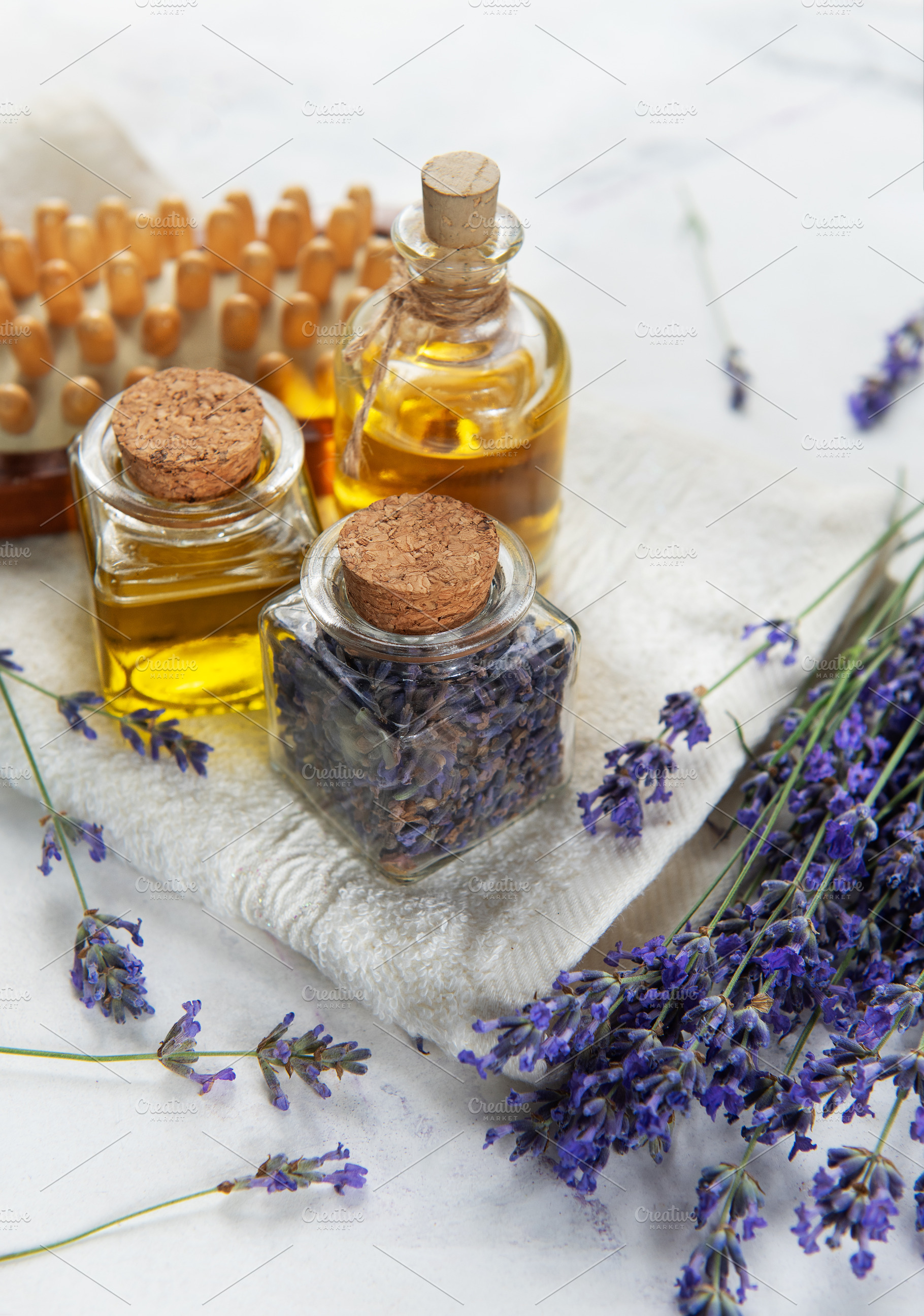 Lavender essential oil massage tools for relaxation and wellness, a Health & Medical Photo by Olena Rudo