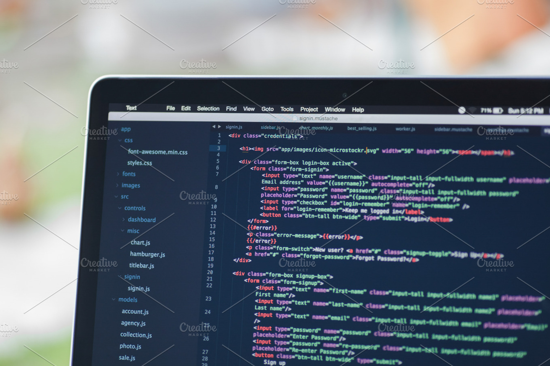 Code syntax on a computer screen featuring html, html5, and laptop, a ...