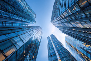 Looking up at tall buildings in city, a Photo by Beautiful things