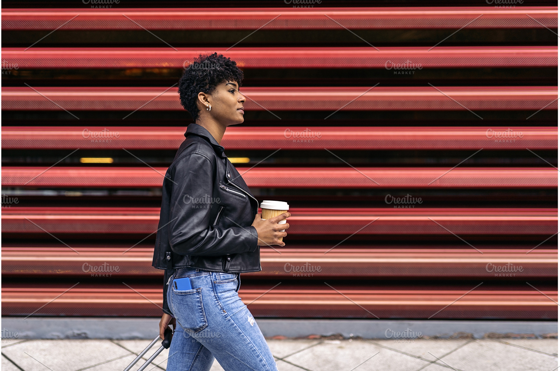 Cool Afro Tourist Woman Walking, a Person Photo by nunezimage