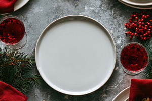 Elegant Christmas dinner table setting with festive decorations
