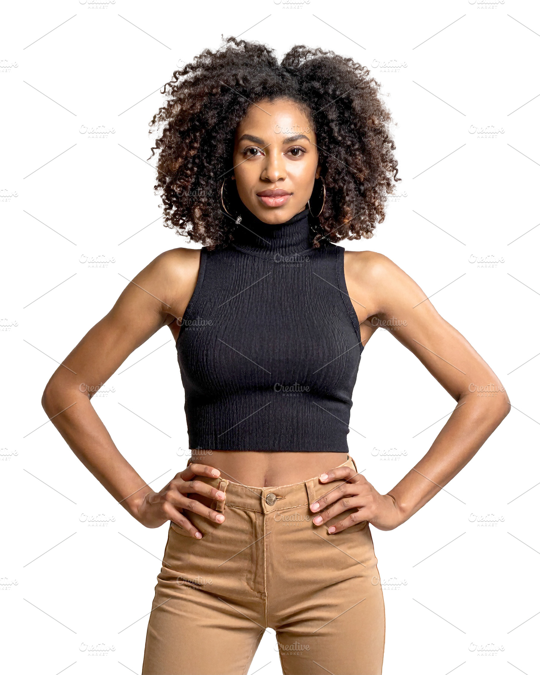 Black woman standing in front of a neutral backdrop wearing a bo, a Person Photo by DanFLCreativo