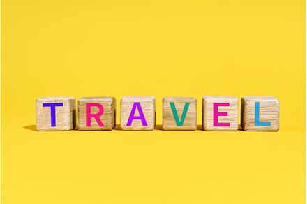 The word TRAVEL on wooden blocks on