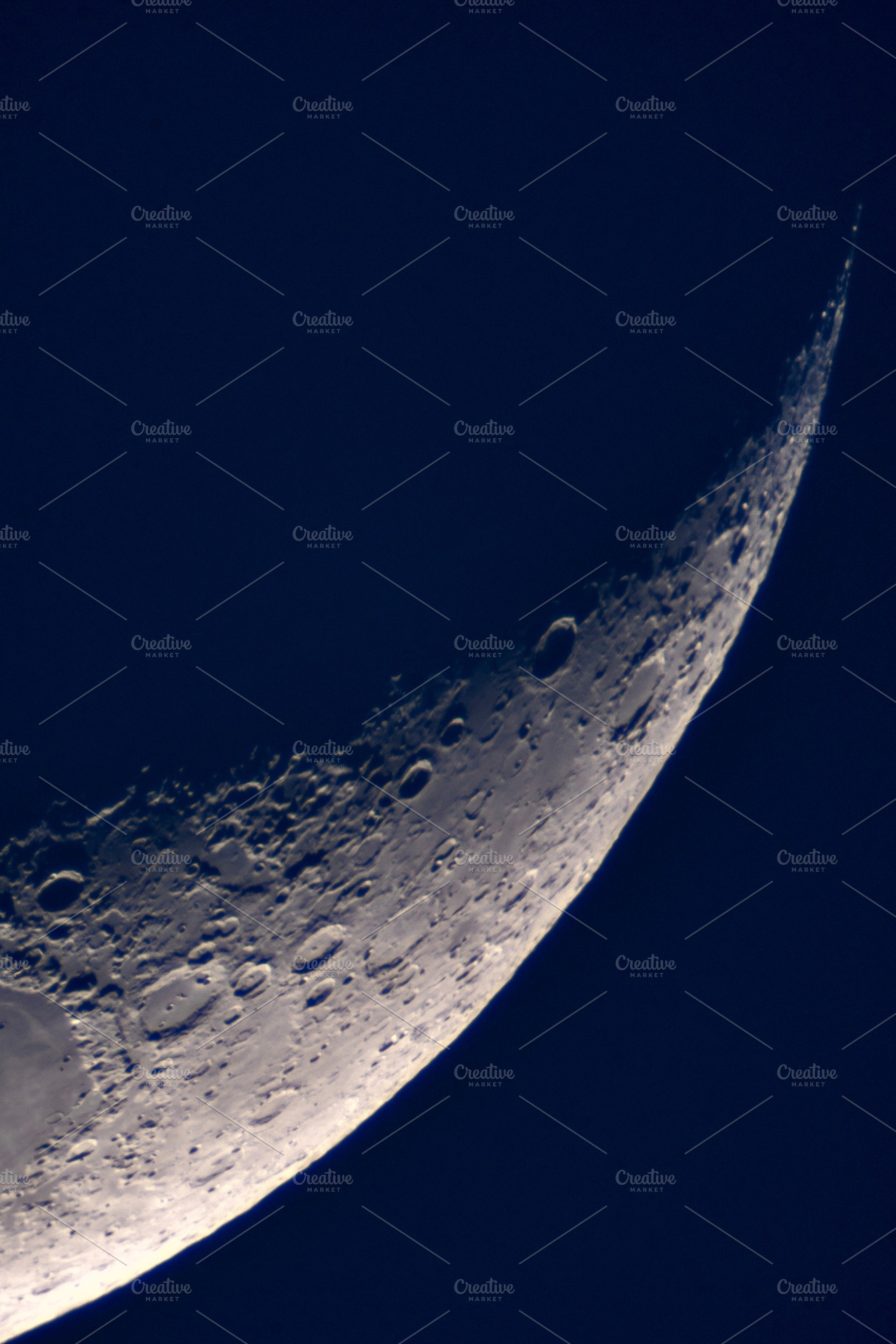 Detailed crescent moon against dark, a Wallpaper Photo by Elena Vagengeim