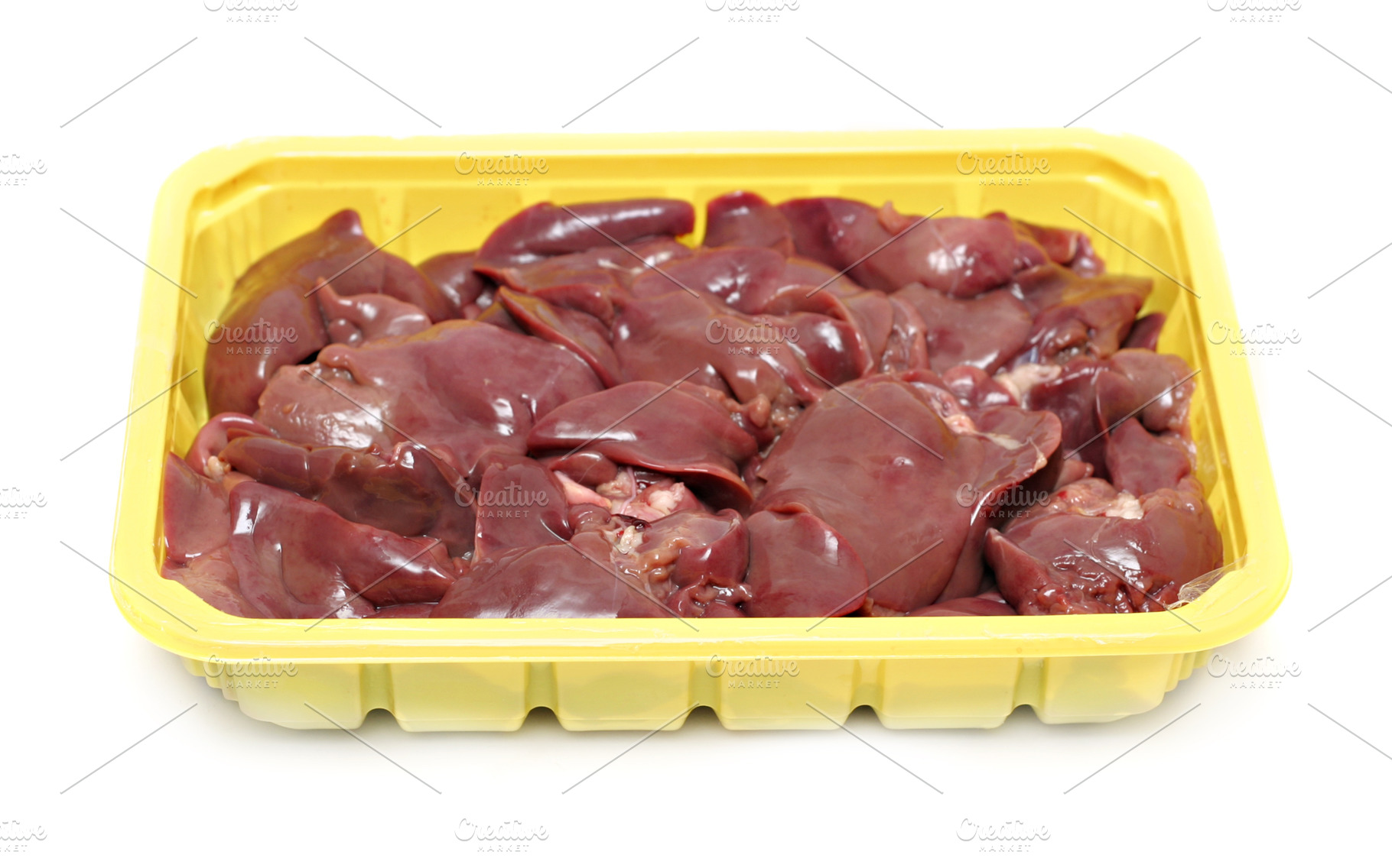 Raw liver in the plastic plate isolated, a Photo by saiko3p