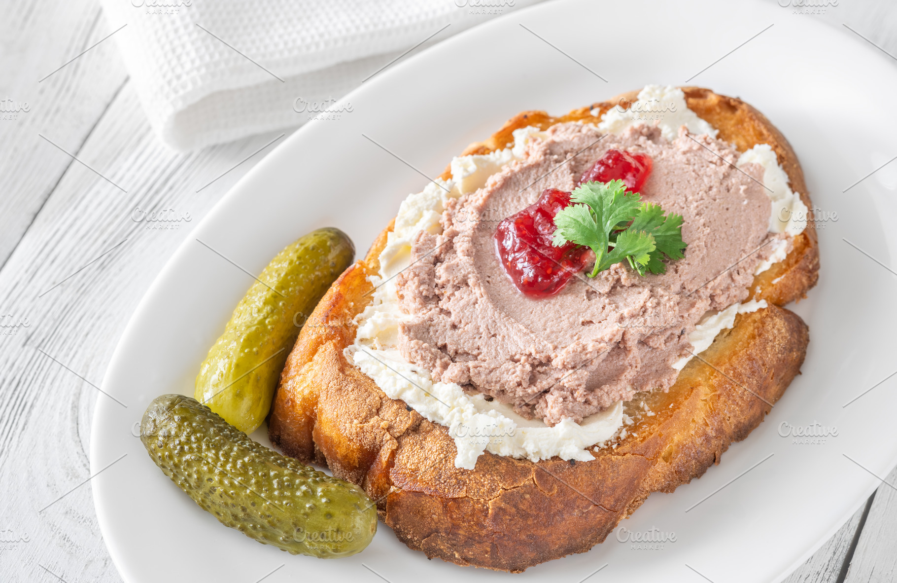 Gourmet sandwich layered with pate,, a Food & Drink Photo by Alexander Prokopenko