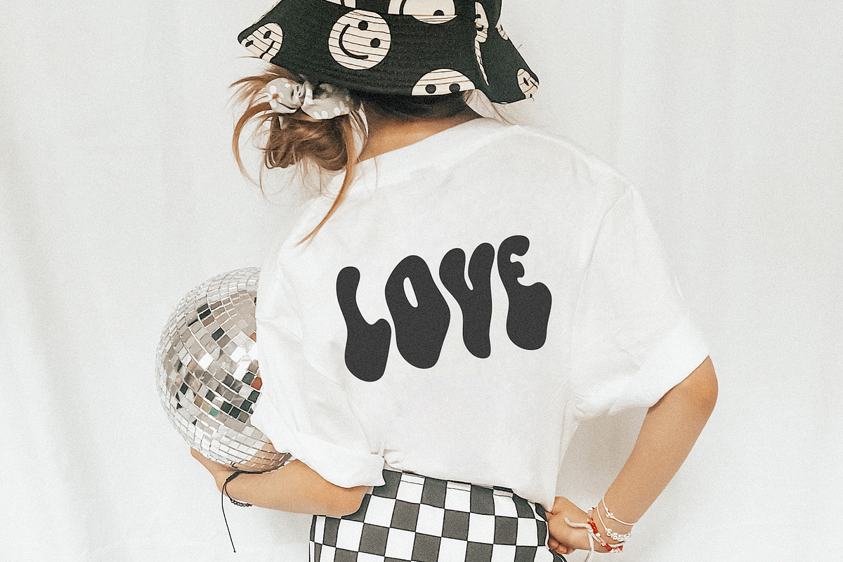 Crazy | Wavy Retro Font, a Sans Serif Font by KA Designs (Photo 8 of 9)