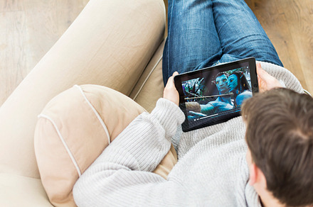 Watching a movie on tablet pc featuring using, tablet pc, and ipad, an Arts & Entertainment Photo by Twin Design