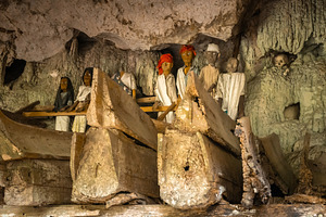 Tau Tau statues in a cave, Toraja, Sulawesi, Indonesia, an Arts & Entertainment Photo by GoodGoods