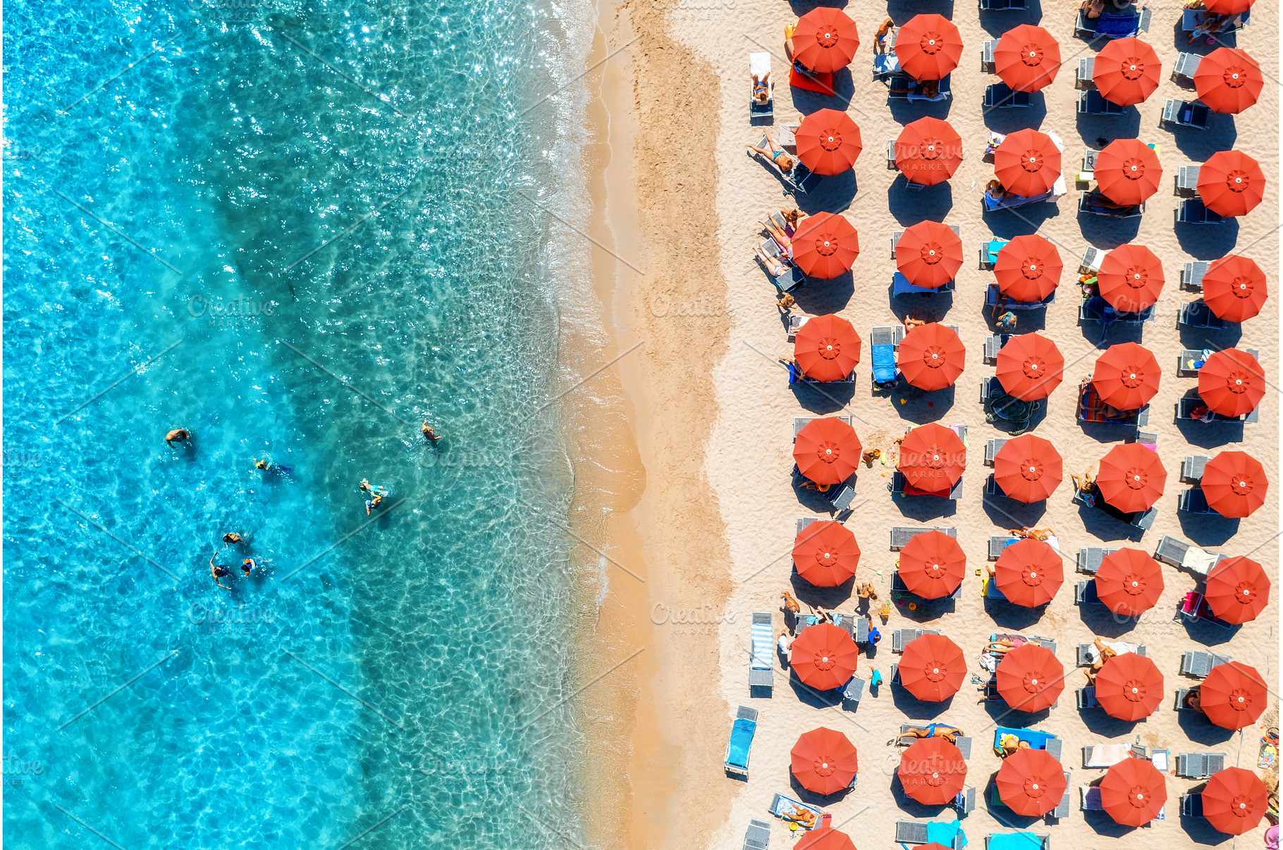Aerial view of colorful umbrellas on, a Nature Photo by den-belitsky