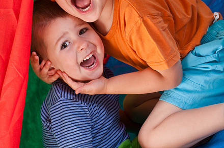 Two brothers lying on grass preview 6