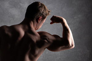 Shirtless man flexing bicep, strong, a Sports & Recreation Photo by Elena Vagengeim