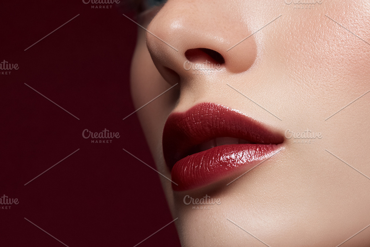 Woman's profile showcasing perfectly applied deep red lipstick,, a Beauty & Fashion Photo by Studio ANNA (Photo 1 of 2)