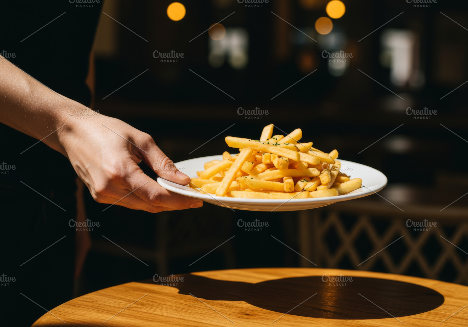 Plate of golden French fries being s, a Food & Drink Photo by professorinc