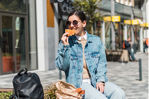 In a bustling city square, a 25, a Person Photo by AD Stock Images