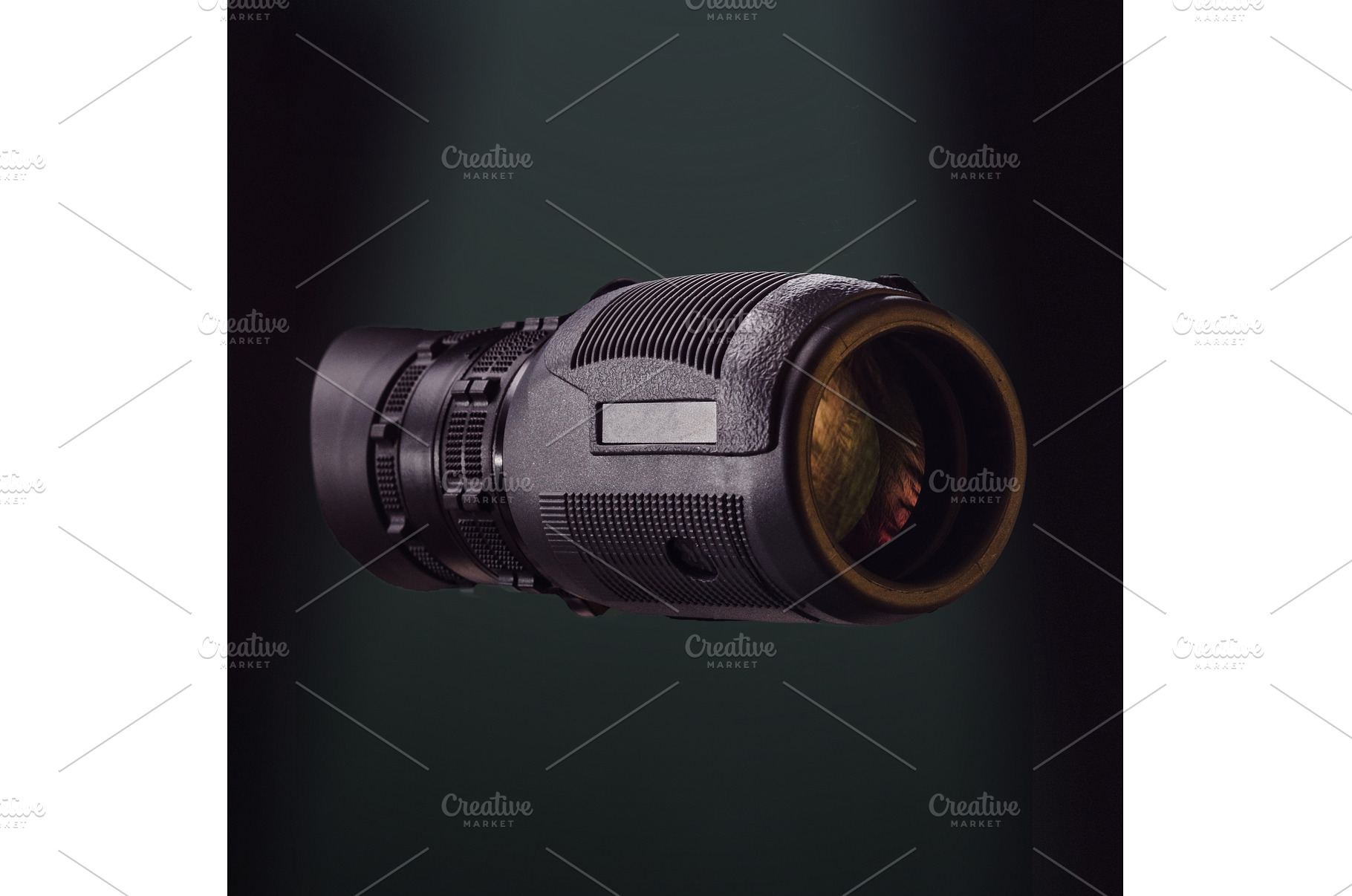 Black monocular on green photo, a Technology Photo by Stockphoto by vzwer