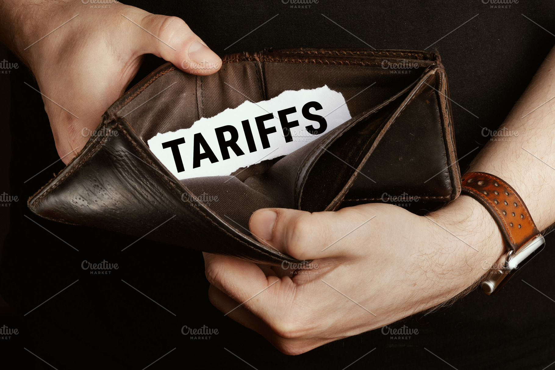 Man's Empty Wallet with Tariffs Burden, a Business Photo by Alliance Images