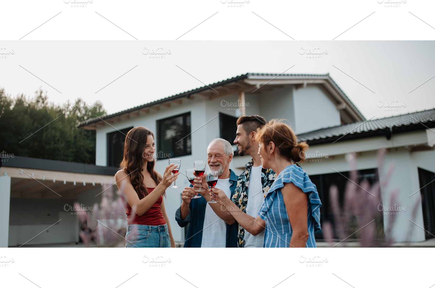 Family toasting with wine during, a Person Photo by HalfPoint