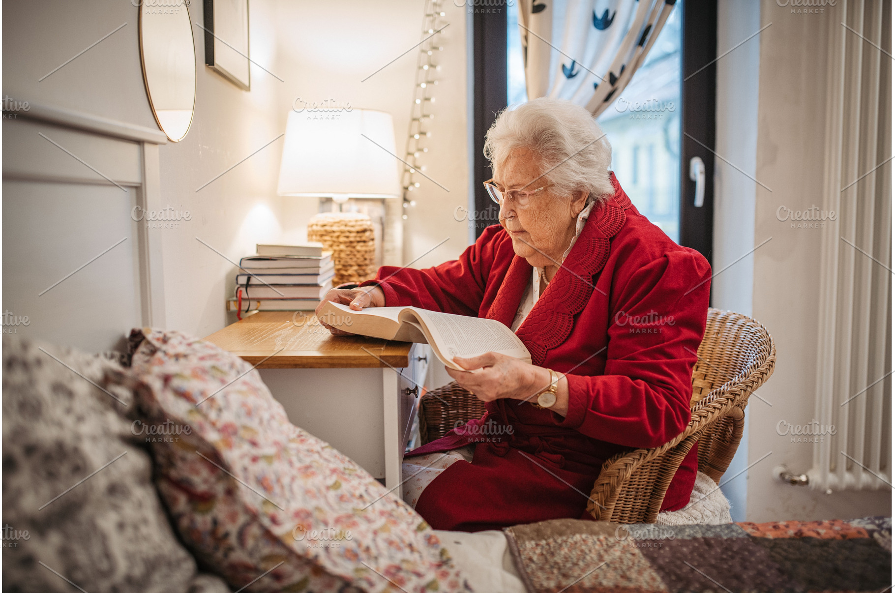 Senior woman relaxing and reading, a Sports & Recreation Photo by HalfPoint