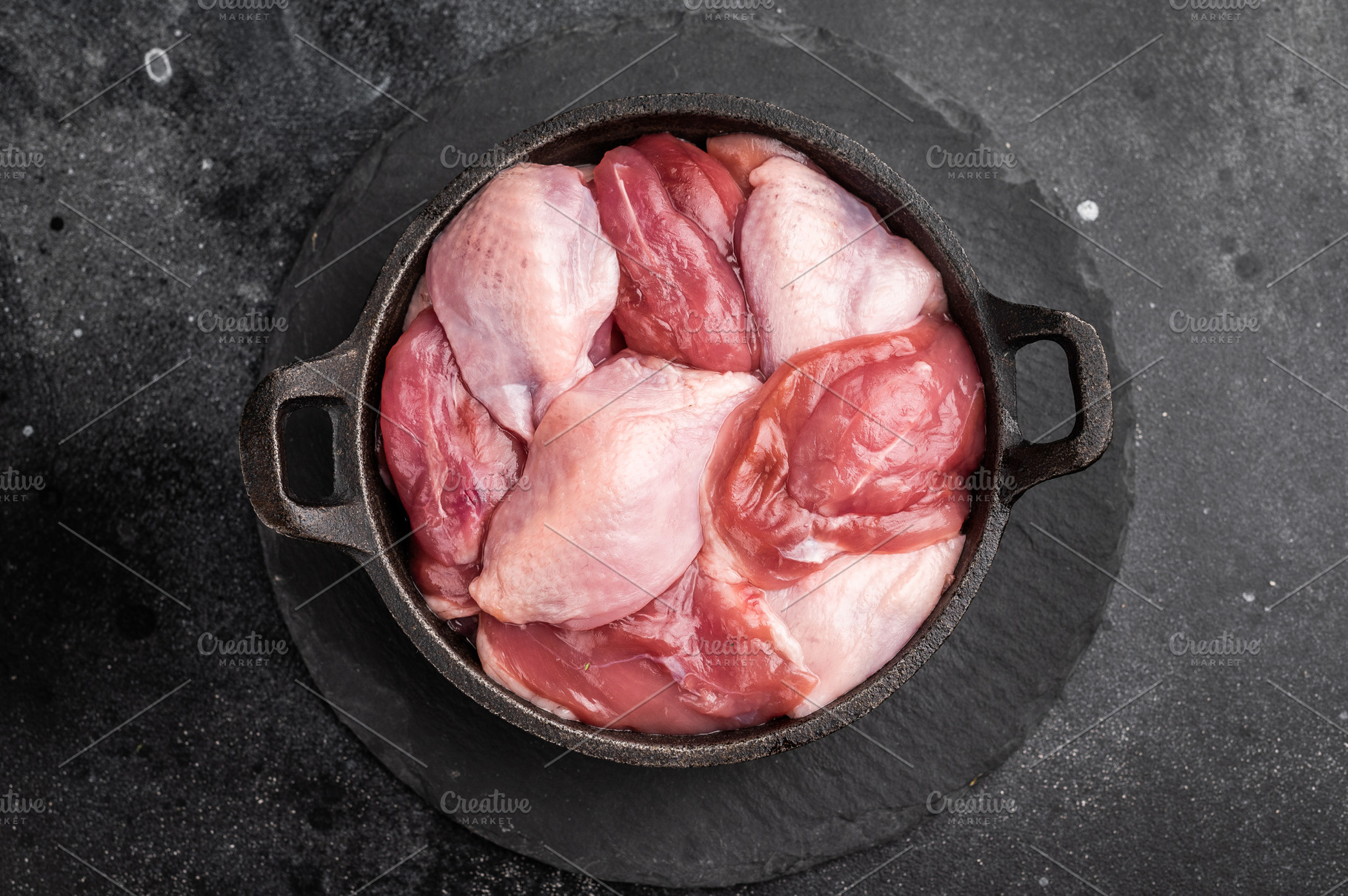 Raw quail breasts in a cast iron skillet with thyme and pink pep, a Food & Drink Photo by composter-box@mail.ru