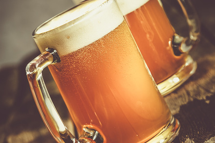 Beer in glasses on rustic background stock photo containing beer and pub, a Food & Drink Photo by NaumenkoOS