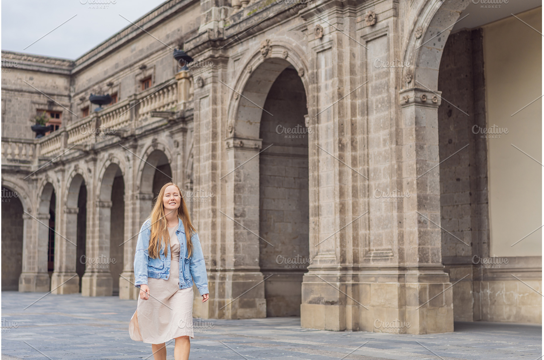 Young woman tourist standing near, an Architecture Photo by Elizaveta Galitskaya